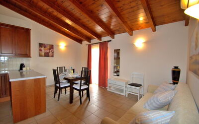 Apartment Superior 5 Balcony: Furniture, Building, Living Room, Wood, Comfort, Interior Design, Picture Frame, Lamp, House, Floor