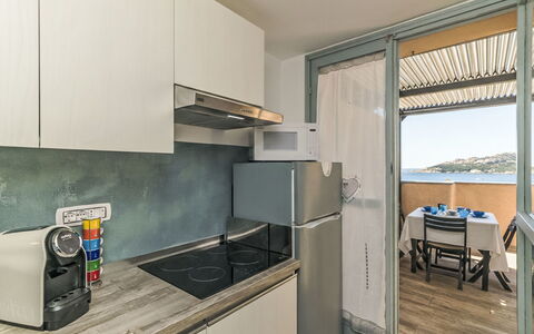 Baia Blu: Apartment, Major Appliance, Kitchen, Wood Stain, Hardwood, Cabinetry, Aluminium, Balcony, Countertop, Kitchen Appliance