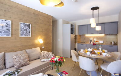 Résidence Odalys Collection L'Eclose 605.2: Couch, Property, Furniture, Table, Orange, Interior Design, Picture Frame, Lighting, Yellow, Living Room