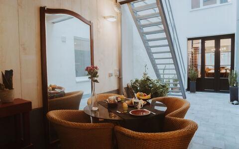 Historical and Spacious Villa Anaïs: Table, Furniture, Plant, Property, Window, Houseplant, Wood, Building, Chair, Flowerpot