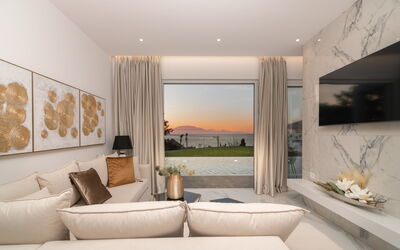 Bouka 3: Couch, Comfort, Interior Design, Wood, Shade, Living Room, Floor, Flooring, Plant, Real Estate