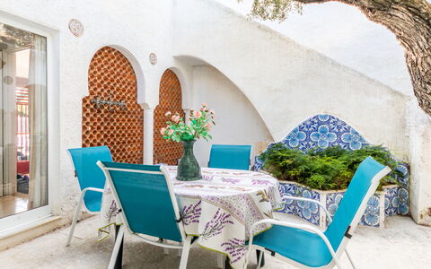 Los Abuelos: Furniture, Plant, Property, Table, Building, Chair, Azure, Interior Design, Outdoor Furniture, Decoration