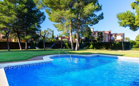 Villa Verdi 11: Sky, Building, Plant, Window, Tree, Urban Design, Residential Area, Asphalt, Wheel, Road Surface