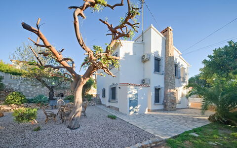 Villa Carmen: Sky, Building, Plant, Window, Tree, Urban Design, Residential Area, Asphalt, Wheel, Road Surface