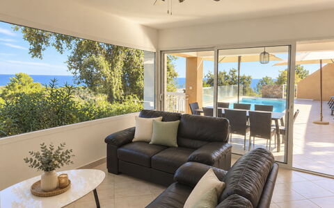 Villa Orizonte: Furniture, Flooring, Couch, Floor, Interior Design, Ceiling, Table, Chair, Living Room, Lighting
