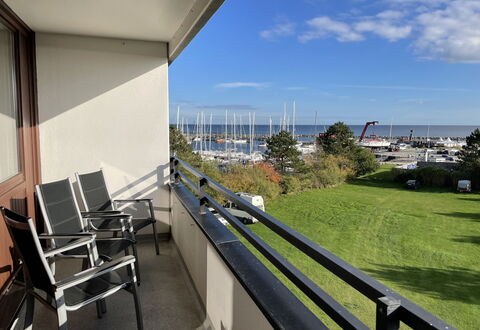 Sander: Sky, Cloud, Property, Plant, Building, Chair, Shade, Urban Design, House, Real Estate