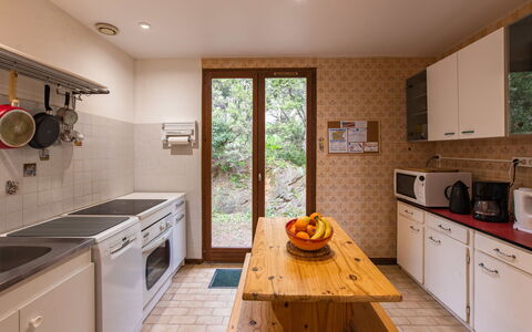 La Planquette: Kitchen, Countertop, Kitchen Appliance, Major Appliance, Wood, Flooring, Interior Design, Floor, Furniture, Cabinetry