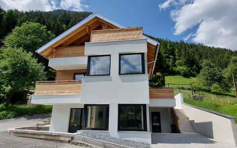 See 52: Cloud, Plant, Sky, Building, Property, Window, Tree, Land Lot, House, Stairs