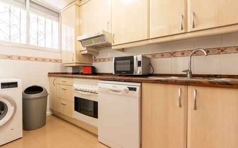 Sol España: Cabinetry, Countertop, Property, Kitchen Stove, Kitchen Appliance, Window, Kitchen, Wood, Cooktop, Home Appliance