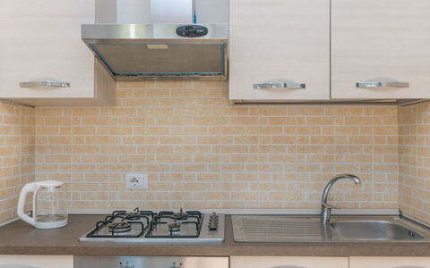 Lampara: Kitchen Sink, Countertop, White, Cabinetry, Tap, Sink, Kitchen, Plumbing Fixture, Kitchen Stove, Lighting