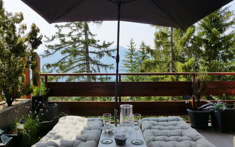 Résidence Byblos 11: Plant, Furniture, Table, Building, Light, Chair, Shade, Architecture, Interior Design, Outdoor Furniture