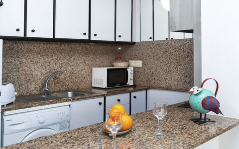 Salou 703: Cabinetry, Countertop, Property, Sink, Interior Design, Wood, Kitchen, Building, Tap, Flooring