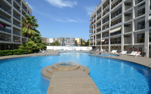 Salou 723: Plant, Sky, Water, Property, Building, Azure, Tree, Swimming Pool, Urban Design, Arecales