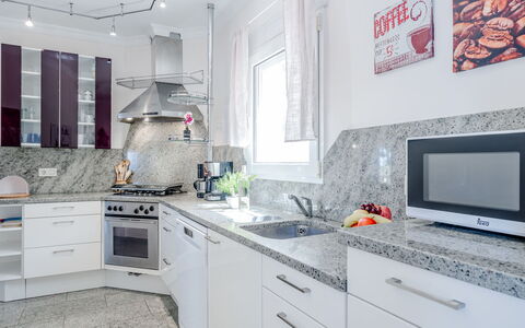 Villa Rosa: Kitchen, Countertop, Kitchen Appliance, Major Appliance, Flooring, Cabinetry, Home Appliance, Interior Design, Home, Furniture