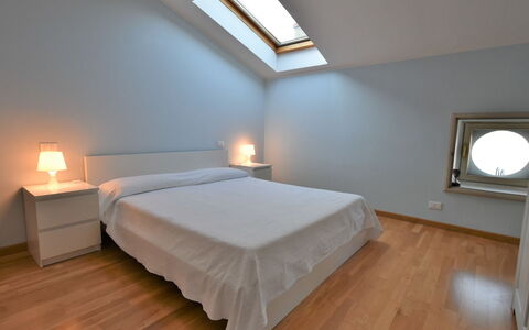 Duomo Mansarda: Furniture, Building, Comfort, Wood, Lighting, Interior Design, Floor, Shade, Bed