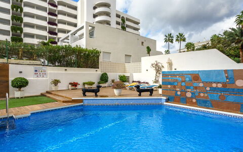 Palm Beach: Water, Plant, Sky, Cloud, Property, Furniture, Swimming Pool, Building, Azure, Blue