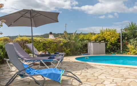 Nimes: Sky, Cloud, Plant, Water, Furniture, Azure, Shade, Swimming Pool, Outdoor Furniture, Sunlounger