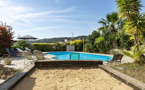 Nimes: Sky, Plant, Cloud, Water, Shade, Tree, Arecales, Swimming Pool, Building, Outdoor Furniture