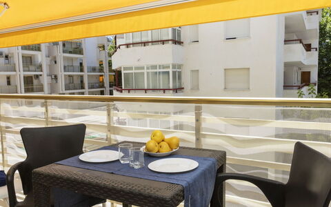 Novelty 5: Table, Furniture, Property, Chair, Building, Tableware, Yellow, Interior Design, Shade, Outdoor Furniture