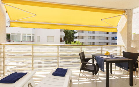 Novelty 5: Furniture, Property, Plant, Table, Chair, Shade, Building, Outdoor Furniture, Architecture, Interior Design