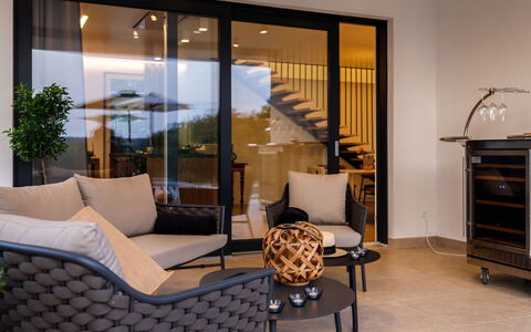 Villa Sonia: Furniture, Property, Plant, Cabinetry, Comfort, Interior Design, Flooring, Floor, Shade, Wood