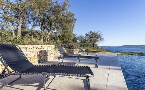 Le Mas du Golfe: Water, Plant, Sky, Property, Nature, Azure, Swimming Pool, Tree, Vegetation, Grass