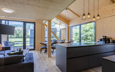 Penthouse # 1B mit Sauna&Außenbadewanne 180.1: Furniture, Table, Couch, Building, Window, Cabinetry, Chair, Wood, Interior Design, Living Room