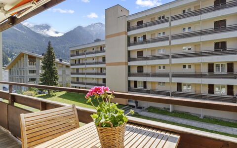 Nr.43 Haus Sotmirana: Building, Sky, Plant, Cloud, Property, Flower, Window, Flowerpot, Interior Design, Outdoor Furniture