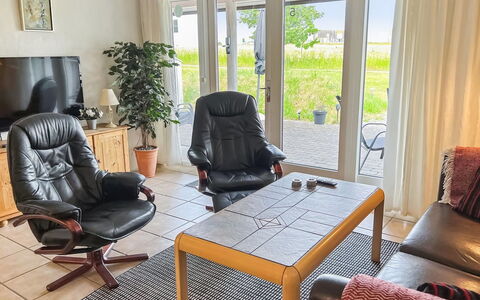 Erica - 6Km from the Sea: Furniture, Flooring, Interior Design, Floor, Chair, Wood, Room, Table, Living Room, Lighting
