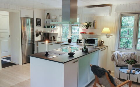 Tume - 200M from the Sea: Kitchen, Countertop, Interior Design, Kitchen Appliance, Flooring, Furniture, Cabinetry, Wood, Floor, Light Fixture