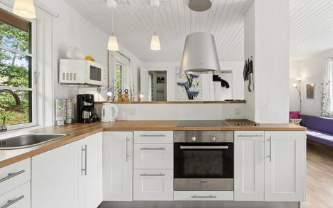 Georg - 300M from the Sea: Kitchen, Countertop, Furniture, Flooring, Cabinetry, Interior Design, Kitchen Appliance, Wood, Floor, Home