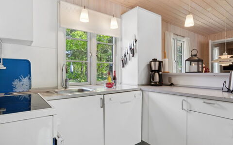 Oisin - 150M from the Sea: Kitchen, Countertop, Kitchen Appliance, Interior Design, Wood, Major Appliance, Flooring, Sink, Cabinetry, Plumbing Fixture
