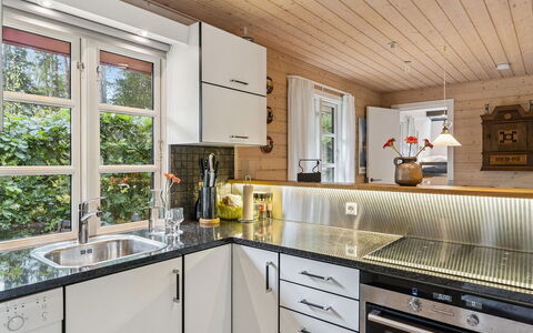 Nahuel - 200M from the Sea: Kitchen, Countertop, Wood, Interior Design, Kitchen Appliance, Flooring, Plumbing Fixture, Major Appliance, Ceiling, Cabinetry