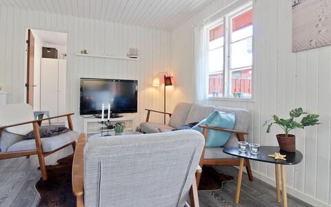 Ronja - 300M from the Sea: Flooring, Furniture, Interior Design, Wood, Floor, Living Room, Wood Flooring, Ceiling, Home, Couch
