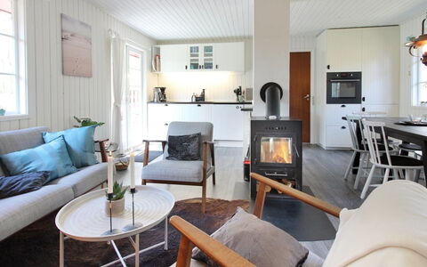 Ronja - 300M from the Sea: Furniture, Flooring, Interior Design, Floor, Wood, Living Room, Wood Flooring, Room, Ceiling, Couch