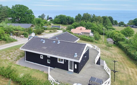 Tjelle - 300M from the Sea: Roof, Home, Door, Cottage, Shade, Siding, Yard, Estate, Backyard