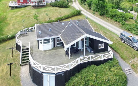 Tjelle - 300M from the Sea: Roof, Home, Door, Cottage, Shade, Siding, Yard, Estate, Backyard