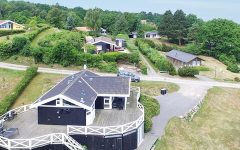 Tjelle - 300M from the Sea: Roof, Home, Door, Cottage, Shade, Siding, Yard, Estate, Backyard