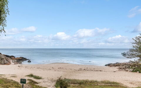 Tjelle - 300M from the Sea: Roof, Home, Door, Cottage, Shade, Siding, Yard, Estate, Backyard