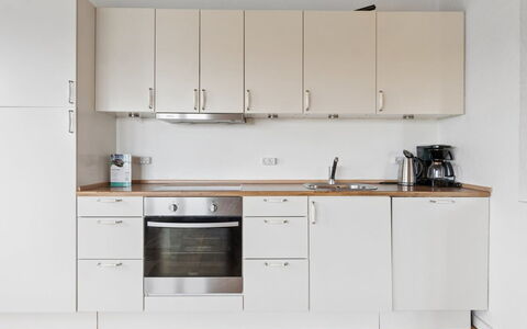 Ensio - 150M from the Sea: Kitchen, Kitchen Appliance, Flooring, Countertop, Cabinetry, Wood, Furniture, Interior Design, Floor, Major Appliance