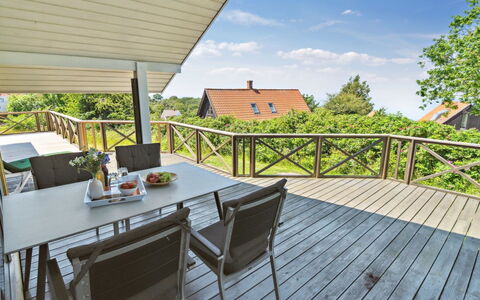 Dagmar - 300M from the Sea: Wood, Furniture, Porch, Deck, Hardwood, Chair, Wood Stain, Wood Flooring, Shade, Balcony