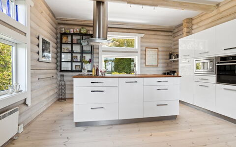 Heli - 200M from the Sea: Kitchen, Flooring, Wood, Countertop, Interior Design, Cabinetry, Wood Flooring, Floor, Furniture, Home
