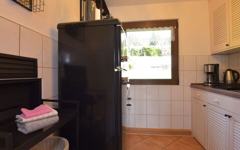 Selma: Property, Cabinetry, Kitchen Appliance, Kitchen Sink, Wood, Building, Home Appliance, Flooring, Interior Design, Countertop
