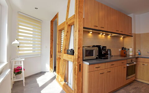 Carola: Cabinetry, Countertop, Building, Kitchen Appliance, Kitchen, Wood, Kitchen Stove, Sink, Wood Stain, Home Appliance