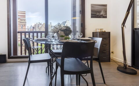 Jean Mermoz: Furniture, Table, Chair, Plant, Wood, Picture Frame, Building, Floor, Flooring