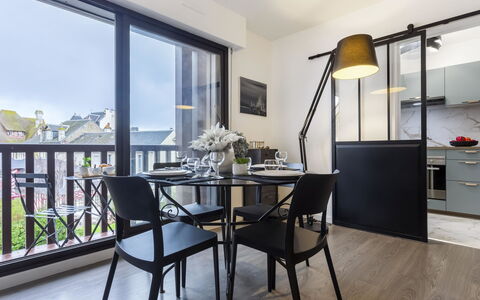 Jean Mermoz: Furniture, Table, Building, Cabinetry, Chair, Window, Lighting, Wood, Interior Design, Plant