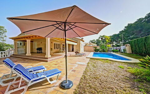 La Sal: Plant, Sky, Building, Table, Tree, Shade, Outdoor Furniture, Outdoor Bench, House, Leisure