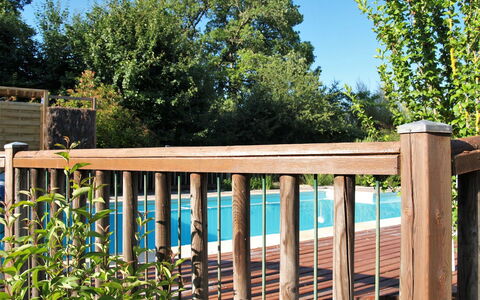 Le Noisetier: Water, Sky, Property, Tree, Building, Swimming Pool, Azure, Body Of Water, Leisure, Urban Design