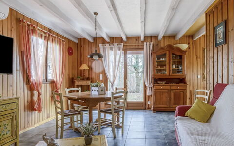 Le Noisetier: Furniture, Table, Wood, Building, Picture Frame, Lighting, Interior Design, Window, Curtain, Cabinetry