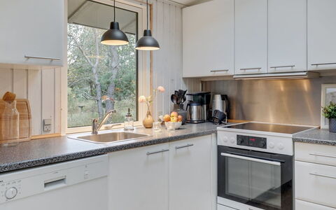 Essi - 300M from the Sea: Kitchen, Countertop, Kitchen Appliance, Interior Design, Cabinetry, Major Appliance, Furniture, Light Fixture, Home Appliance, Flooring